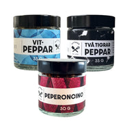 Kryddpaket med peperoncino, hel svartpeppar Två Tigrar och hel vitpeppar Qiong Hai